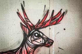 Graffiti fietstunnel Bornem, hertjes, Artist: Dzia.