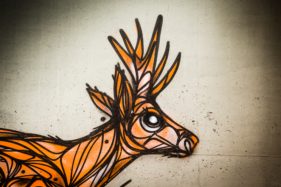 Graffiti fietstunnel Bornem, hertjes, Artist: Dzia.